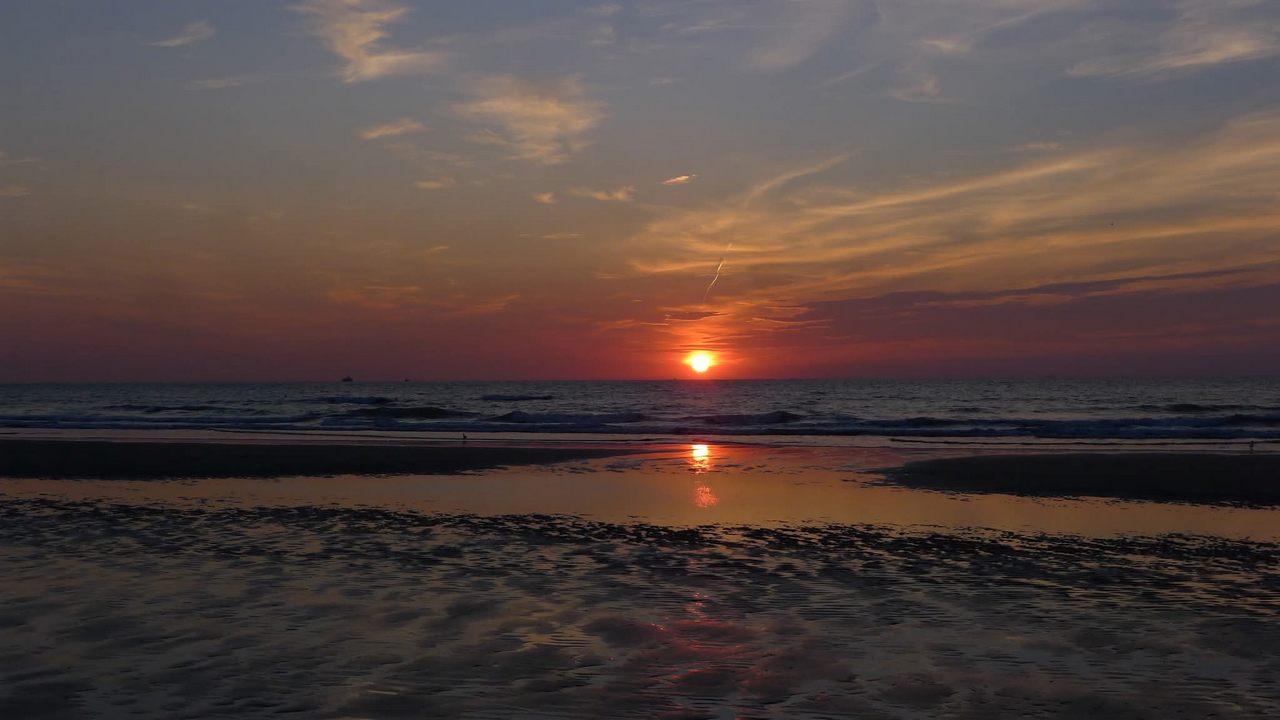 Zonsondergang op het strand van Bredene